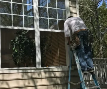 on+ladder+with+windows+open-640w.jpg window replacement Williamsburg, VA Window installation Hampton Roads